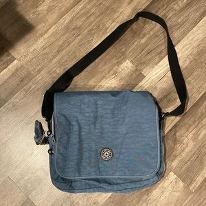 Kipling crossbody bag with 3 zippered compartments in blue